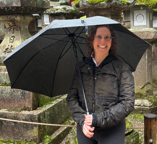 Coach Melissa Fischer Keeps the Rain Off